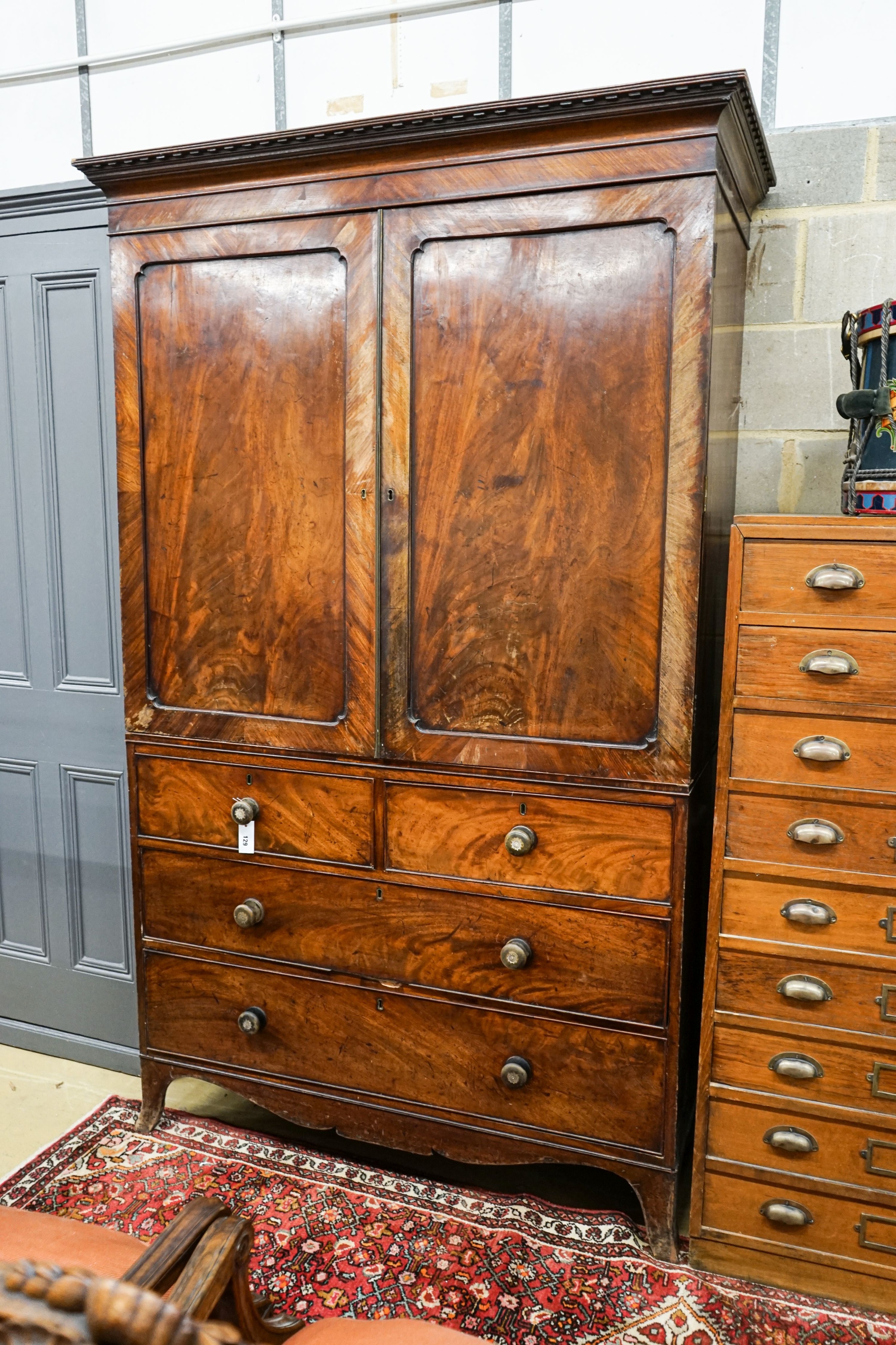 A Regency mahogany linen press, length 124cm, depth 58cm, height 212cm